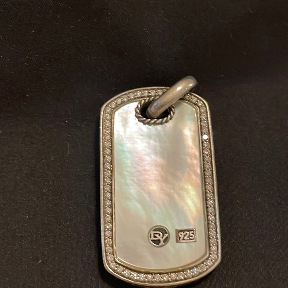 David Yurman ‘dog tag’ with diamonds and mother of pearl.